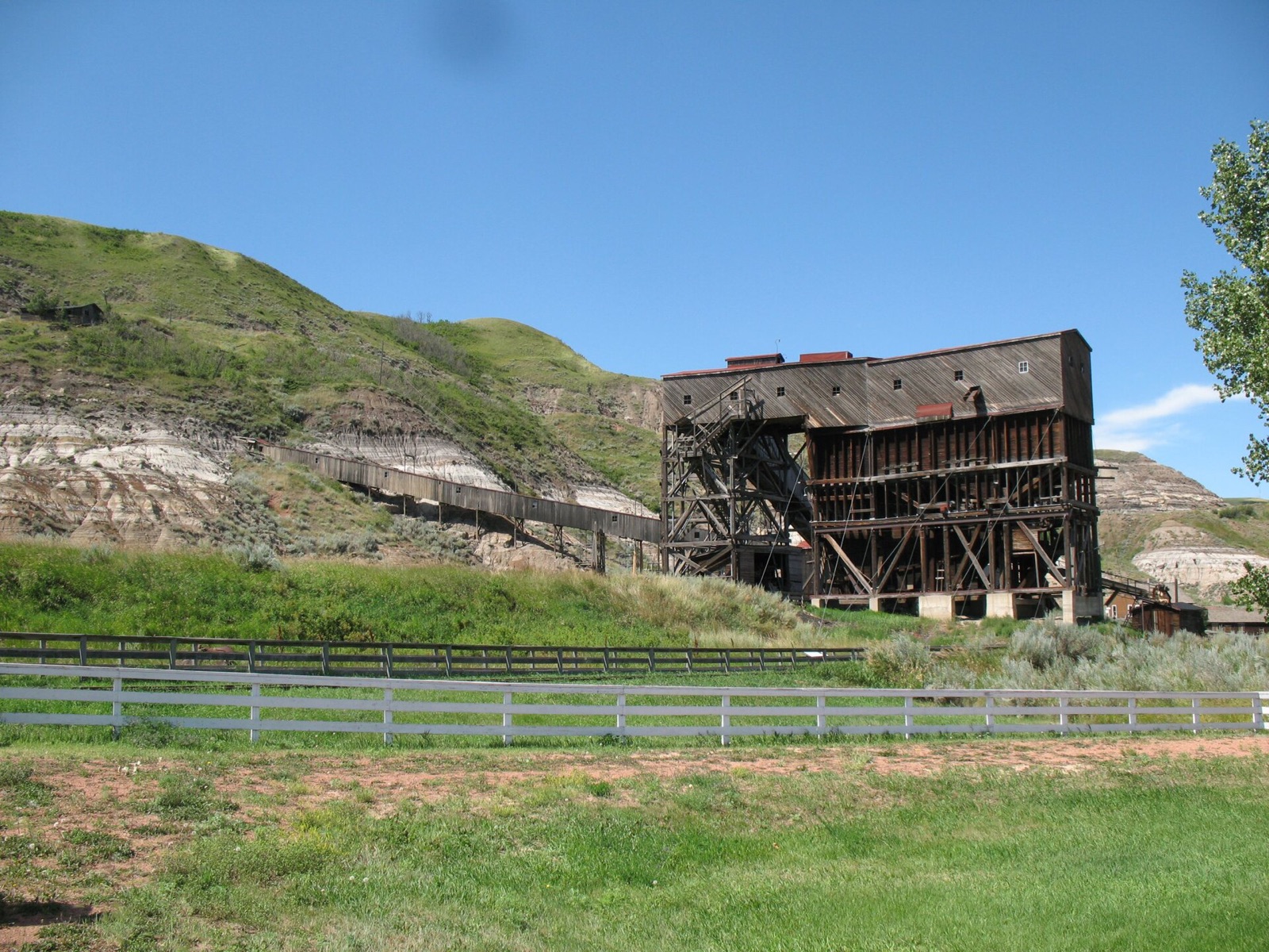 wooden mine tipple over a chasm